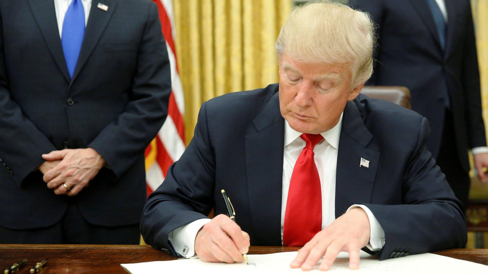 Trump's AI and Cybersecurity Executive Orders: Reshaping Federal Technology Policy in 2025